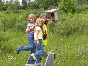 Kids come along to monitor the boxes on the trail.